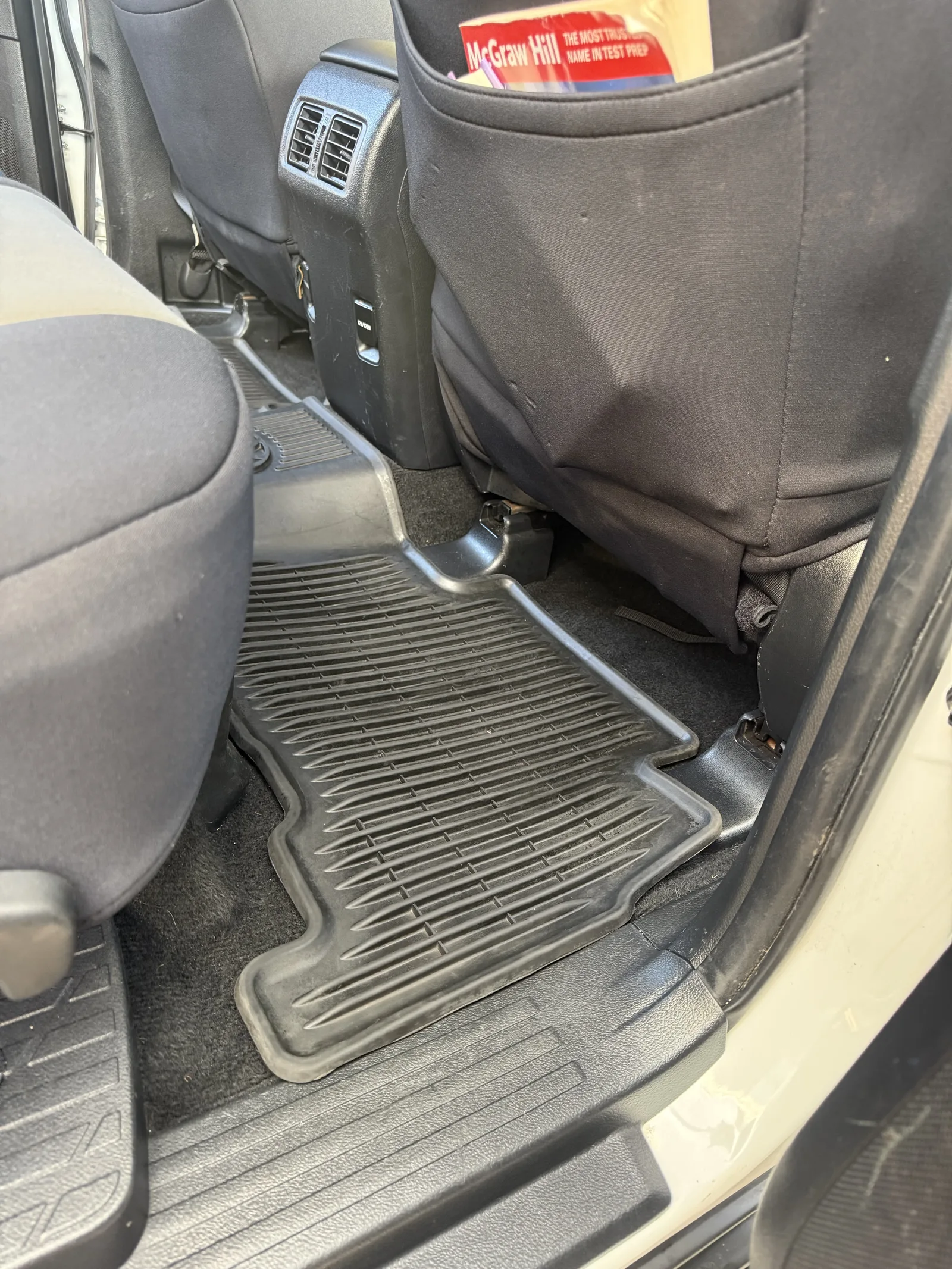 Clean, restored truck floor mat and footwell after Chopped Details interior detailing